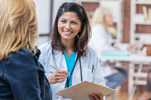 Female provider talking to patient